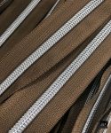 Zipper by the yard #5, Nylon Coil Metallic Silver on Mocha Brown