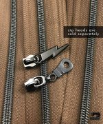 Zipper by the yard #5, Nylon Coil Metallic Gunblack on Mocha Brown - Image 2